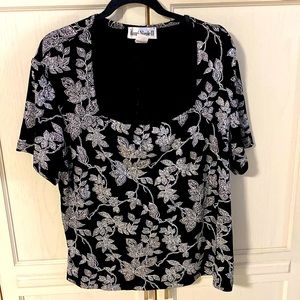 A beautiful sparkly silver and black top in 3X